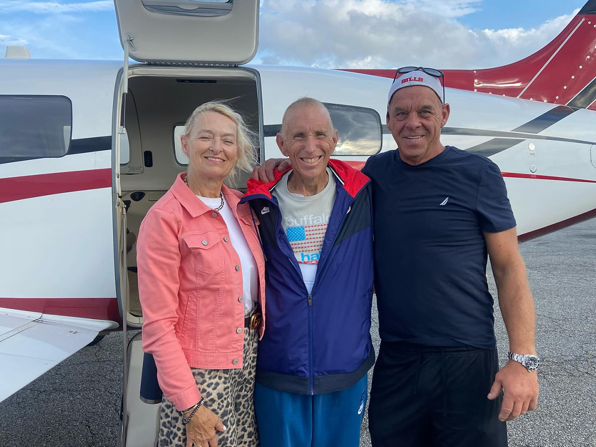 Wings Flights of Hope flying patient Tom (middle) back home to Buffalo from NYC after his medical treatment.