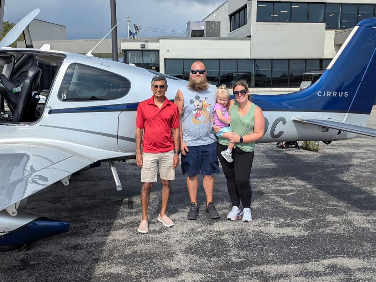 Wings Flights of Hope pilot Mahesh (left) flies patient Emma along with her parents today from Philadelphia back home to Buffalo.